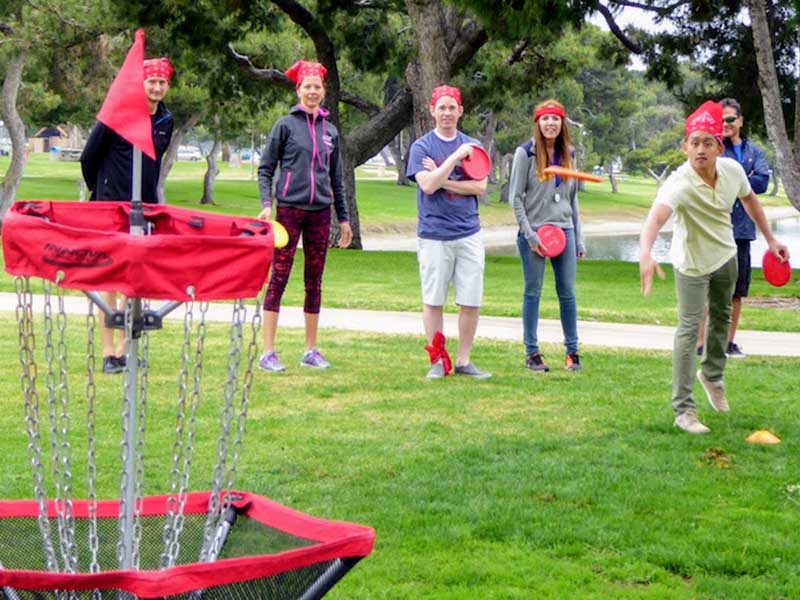 Leisure Olymics team-building games includes Disc Golf which is also known as Frisbee golf | Out of the Ordinary Group and Team Adventures