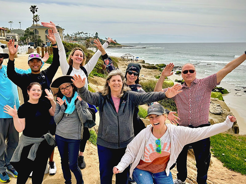 Group of people lifting their hands