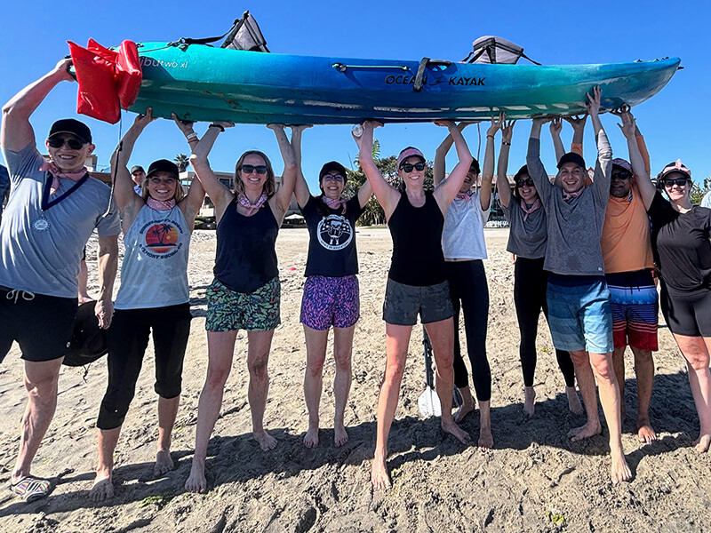 people-holding-a-kayak